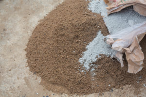 Rénovation : mélange sable et ciment